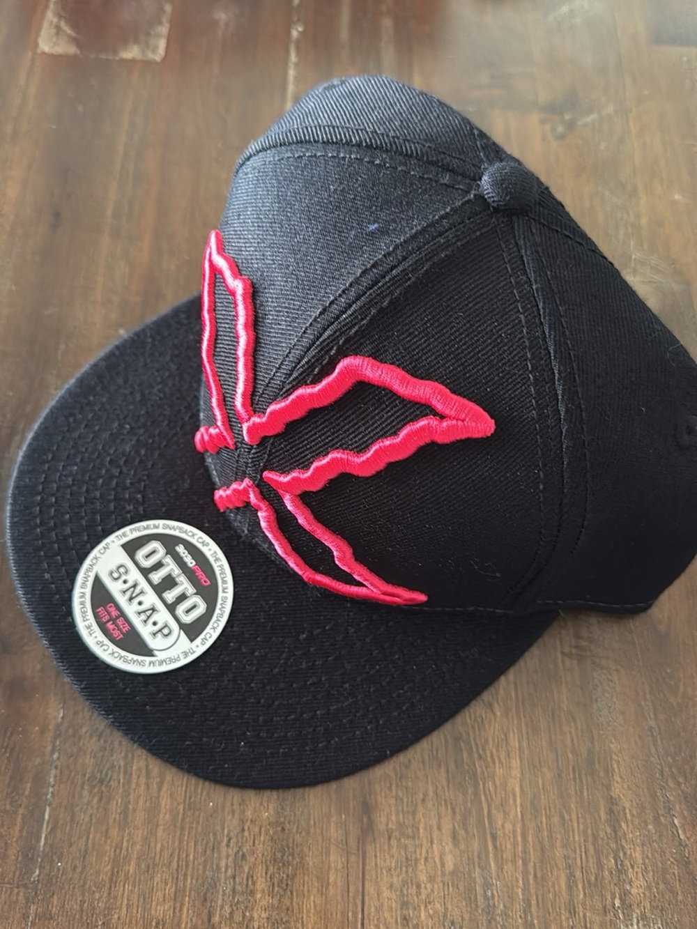 Black Snapback Hat with Hot Pink Embroidered Logo